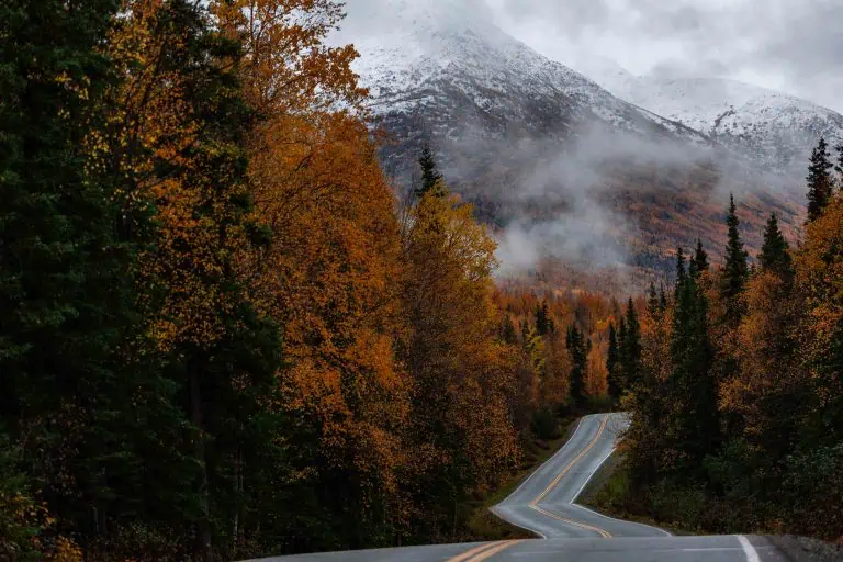 eklutna lake image of road with mountains in background moody fall pretty alaska