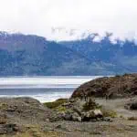 beluga point along turnagain arm image with land in foreground and mountains in background summer moody and pretty day